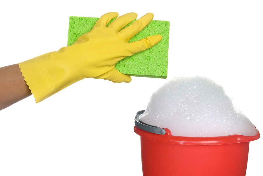 Fundraising ideas, hand in rubber glove with sponge and bucket