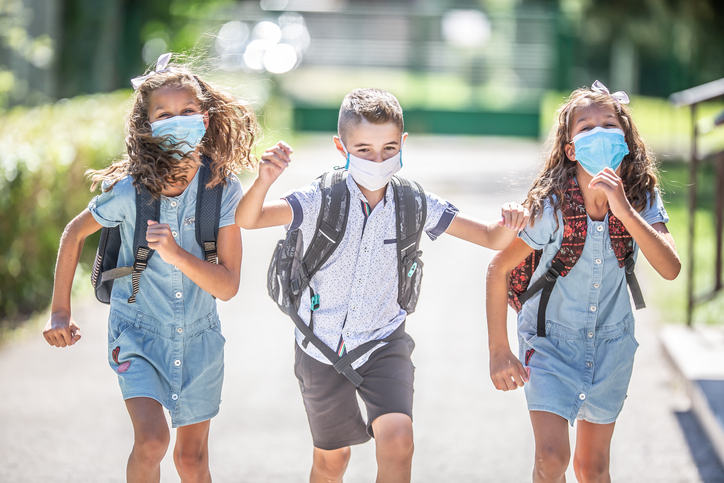 kids wearing masks at school for COVID safety 