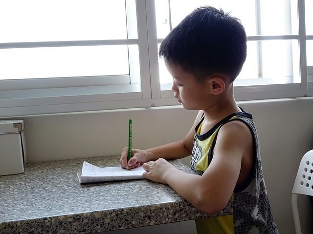 Child Doing Common Core Math Homework